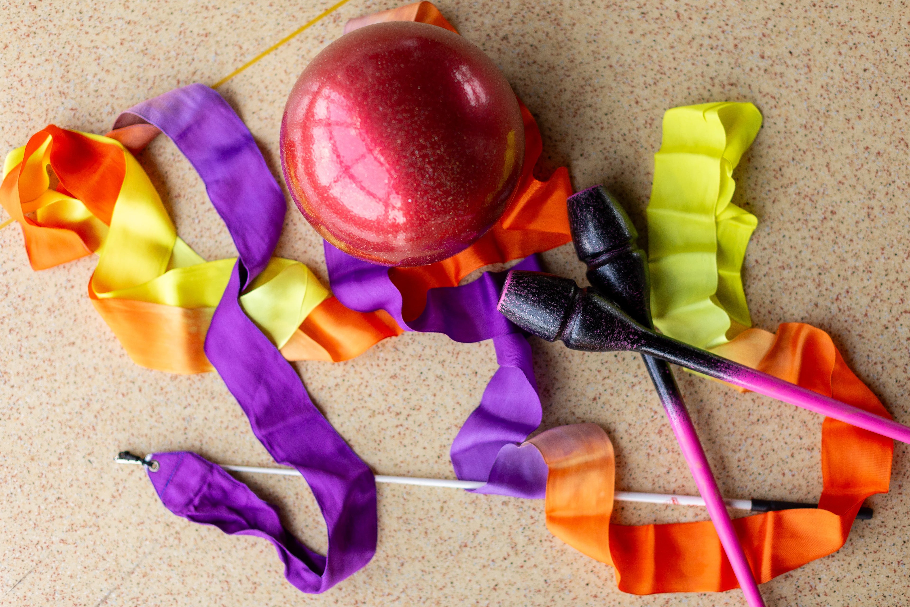 Collection of ball, ribbon and clubs