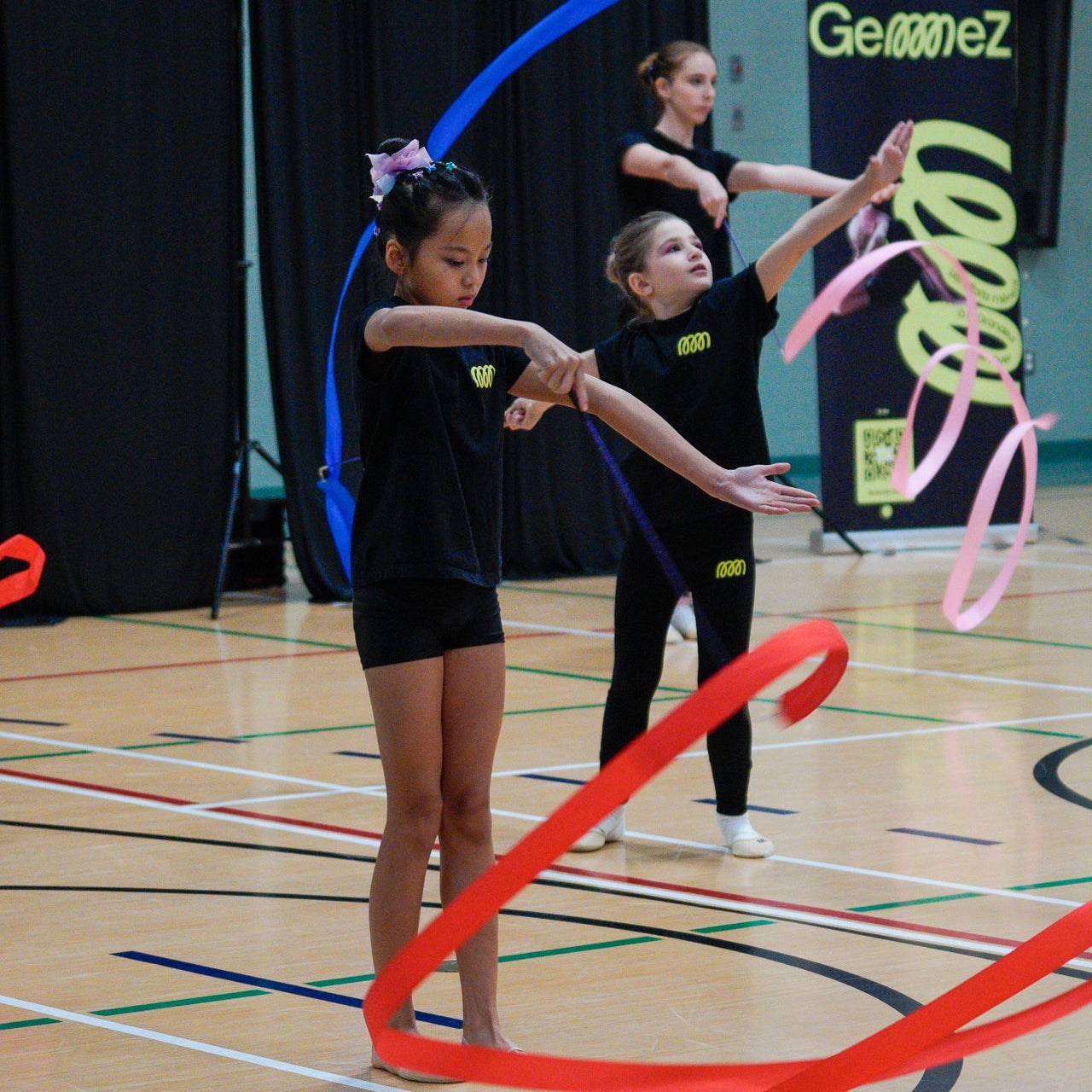 Gymnasts warming up with ribbons