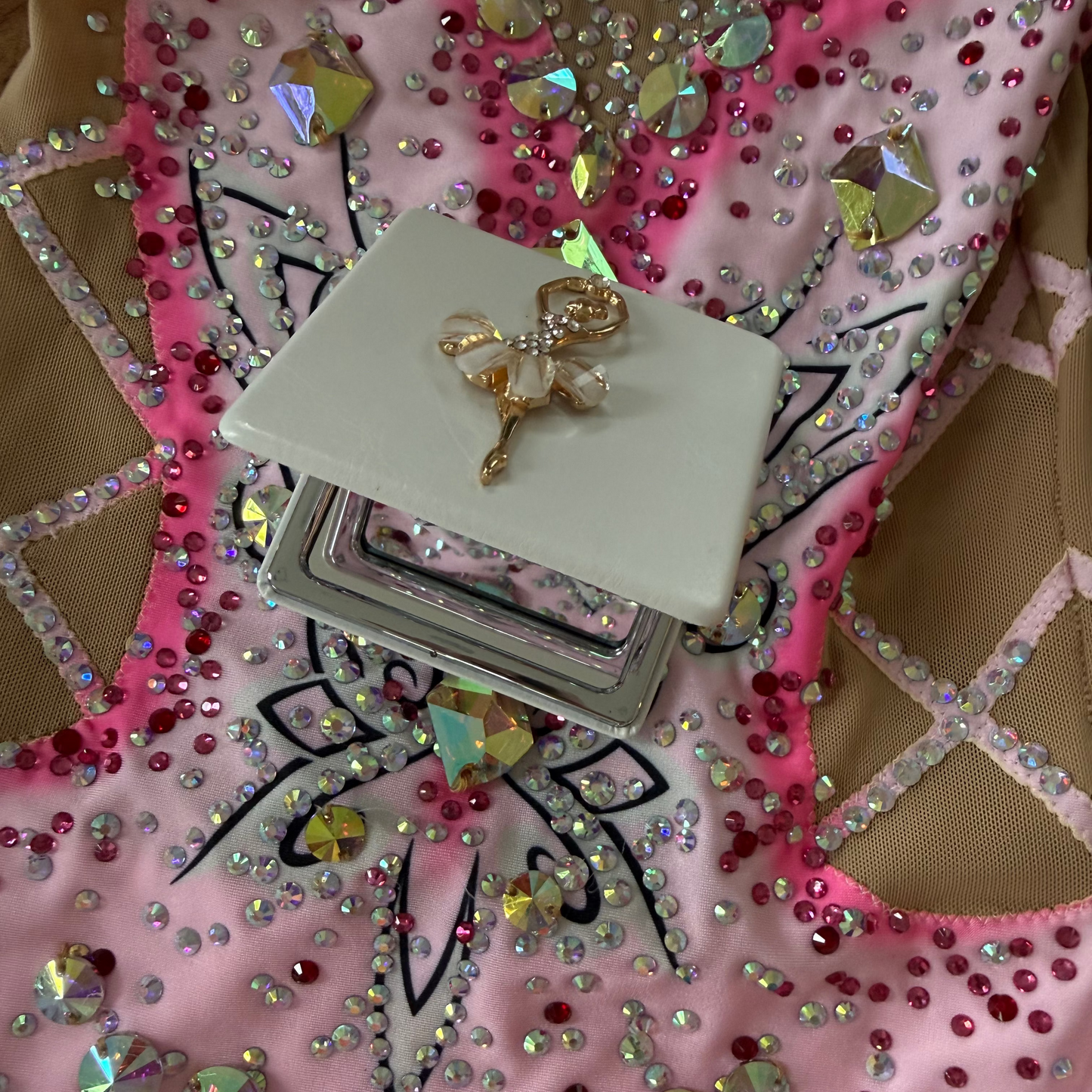 Open Mirror embellished with a ballerina on a leotard background
