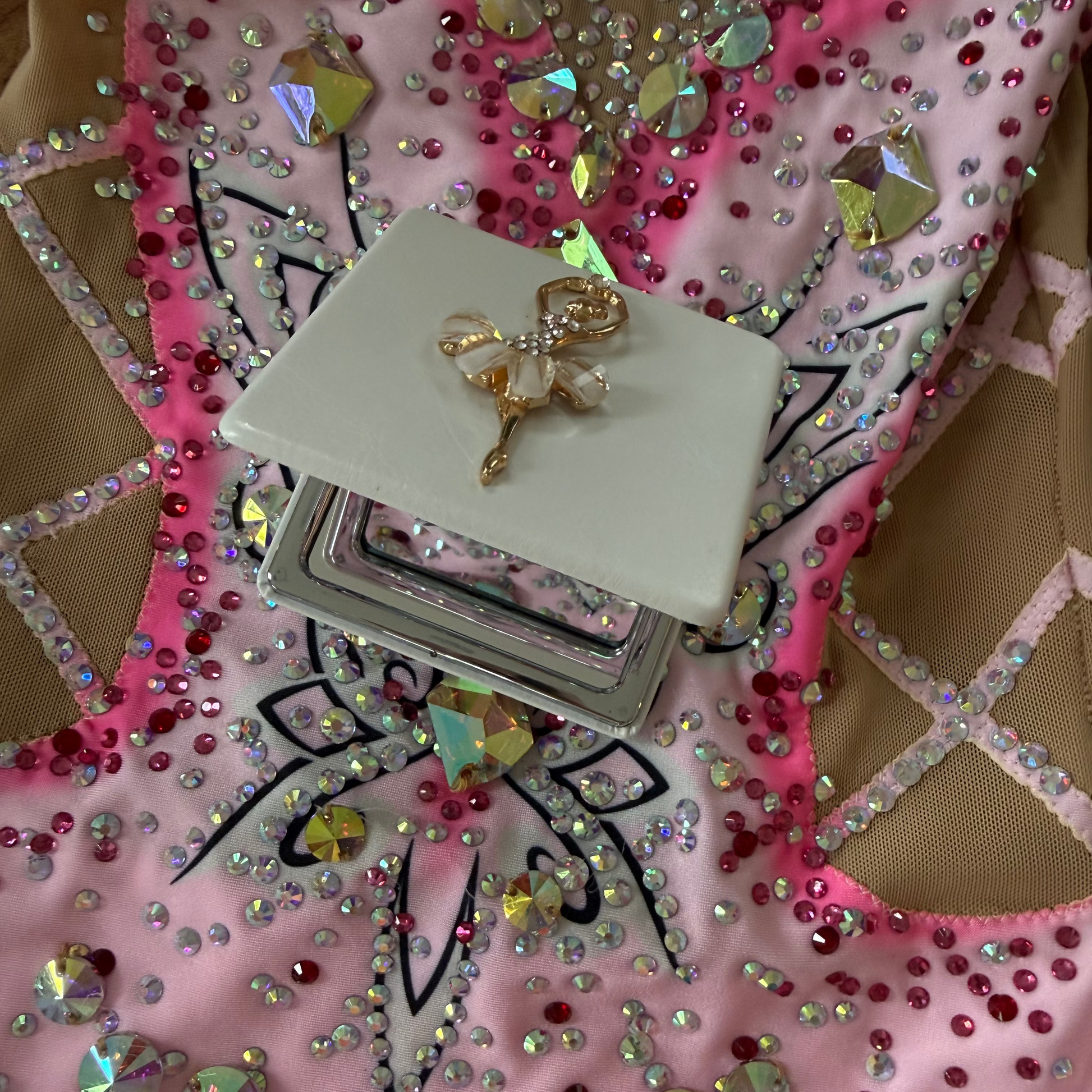 Open Mirror embellished with a ballerina on a leotard background