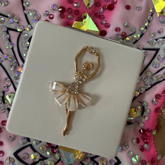 White mirror with ballerina design with a pink glittery leotard background
